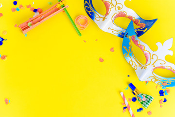 Purim with carnival mask and party costume