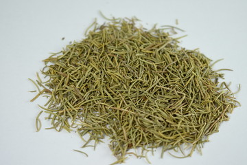 dried rosemary  in a porcelain plate - close up of a rosemary background food