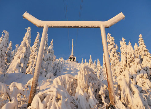 Snowy mountain hut transmitter
