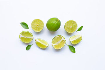 Limes with slices and leaves ion white