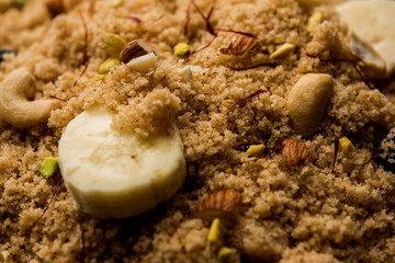 Semolina Halwa / Sooji ka Halva or sweet Rava Sheera or shira - Indian festival sweet made of semolina, nuts and Ghee