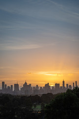 Fototapeta premium Melbourne city skyline at sunset, Vertical
