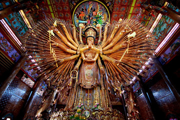 Take photo  large Guan Yin Bodhisattva carved from wood 12 meters high in Wat Metta Photiyan © smilekorn