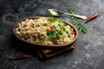 Rava Upma / Uppuma - south indian breakfast served in a bowl. selective focus