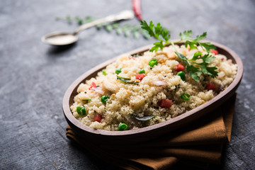Rava Upma / Uppuma - south indian breakfast served in a bowl. selective focus