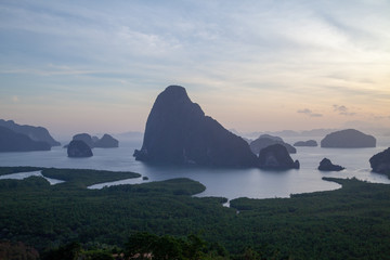 Fabulous view of the mountains, jungles and the sea from a height at dawn. Thailand Phang nga