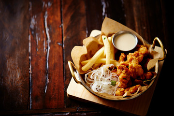Fried chicken with fried potato 