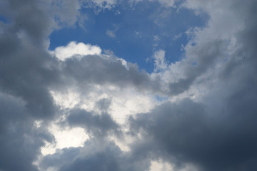 Obraz premium Dark sky clouds cloudscape over the sunset
