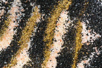 Layered colorful sand pattern. Marble style background. Black, white and gold powder texture