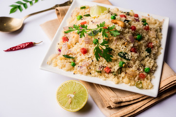 Rava Upma / Uppuma - south indian breakfast served in a bowl. selective focus
