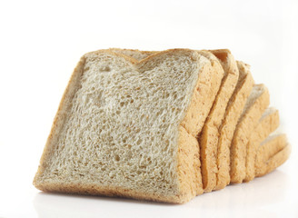 Sliced whole wheat bread on white  background