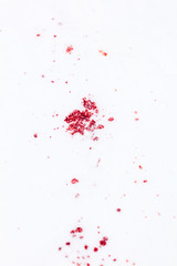 Obraz na płótnie Canvas Red blood on white snow as a background