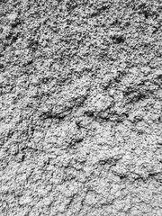 Gray plaster coat on the wall as a background
