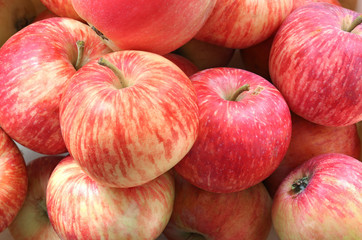 Very tasty and juicy apples at a farmers market. Background
