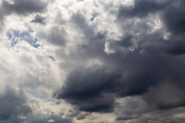 Fototapeta premium Clouds after rain before sunset as a background