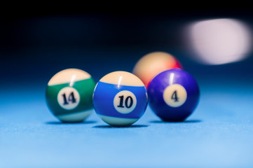 Colorful billiards balls. Billiard ball at blue table. Colorful