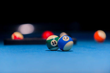 Colorful billiards balls. Billiard ball at blue table. Colorful