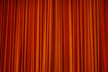 Red stage curtain at the theatre