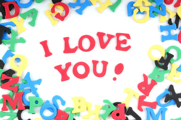 Fototapeta premium I love you spelled out with colorful foam rubber letters