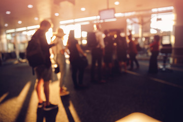 Blurred background, airport people are tourists waiting for landing on flight of aircraft