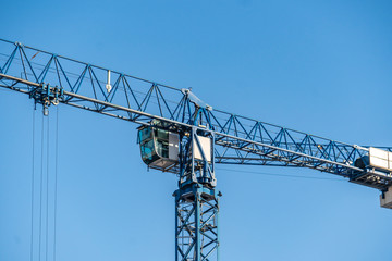 Fototapeta na wymiar construction crane frame building against the sky b