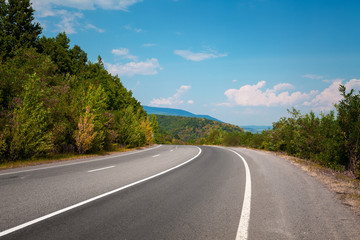Fototapeta premium asphalt road and mountain