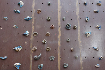  artificial climbing wall with a variety of holds