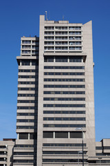 the concrete tower building Hochhaus Lister Tor in Hannover, Germany, is an example for brutalist...