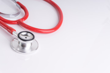 Stethoscope On White Background with selective focus and crop fragment