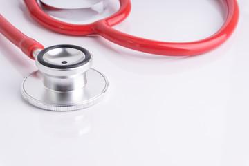 Stethoscope On White Background with selective focus and crop fragment