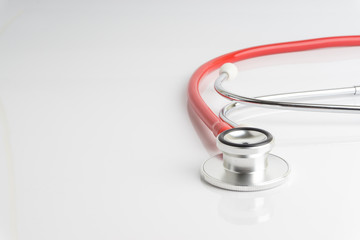 Stethoscope On White Background with selective focus and crop fragment