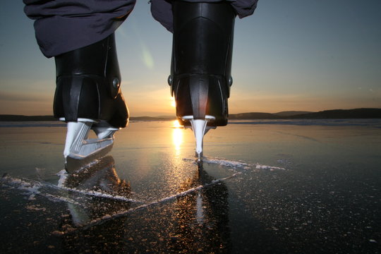 man scating on the frozen lake