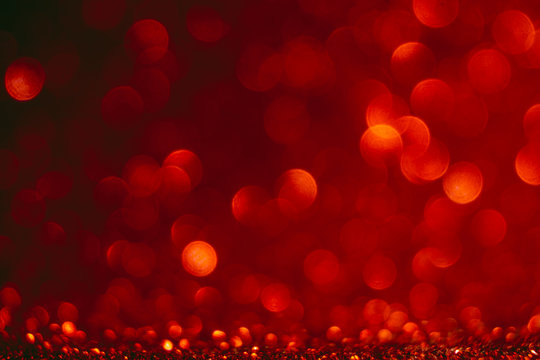Defocused Valentine's day concept. Red bokeh and red background.