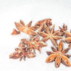 Asian spices, Star anise spice fruits and seeds isolated on white background closeup