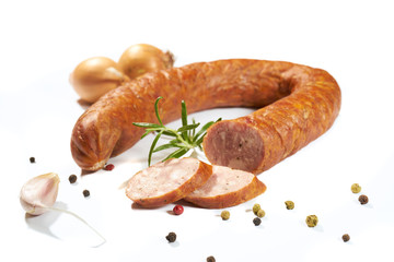 Sausage with herbs and spices on a white background