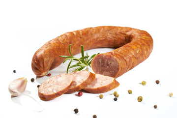 Sausage with herbs and spices on a white background