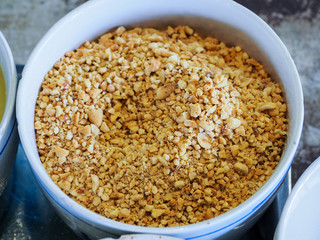 Garnish noodles seasoning Thai style on wood table- sugar, dried.