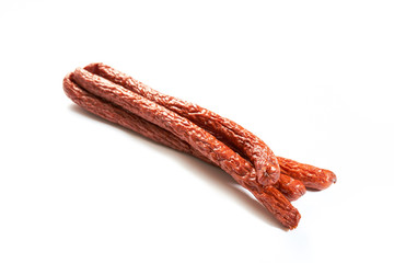 Sausage with herbs and spices on a white background