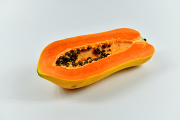 Slices of papaya on white background.