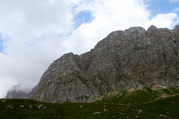 Obraz premium Photo of nature - beautiful stony mountain cliff with bright blue sky