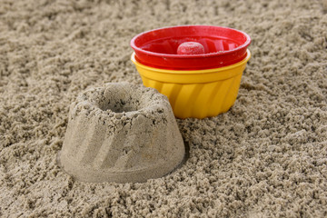 Cakes in the sandbox, close-up