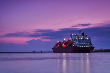 LNG TANKER - Ship at dawn moored to the gas terminal