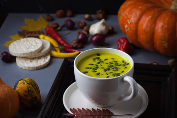 Pumpkin asian coconat cream soup. Autumn hot food