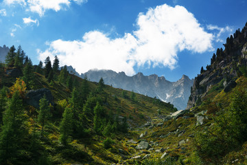 Fototapeta na wymiar Landscape of the Alpine Mountains on the route of the Mont Blanc Tour from the Italian side.