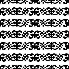 Woodblock printed seamless ethnic floral pattern. Traditional oriental ornament of India Kashmir, vines wave motif, black on white background. Textile design.