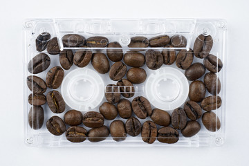 Film cassette filled with coffee beans.