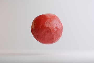 Levitating red ball in the studio