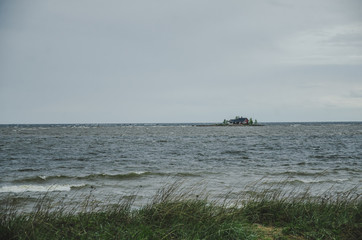 Lonely island on a lake