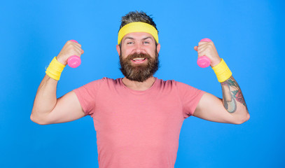 Man bearded athlete exercising dumbbell. Motivated athlete guy. Athlete on way to stronger body....