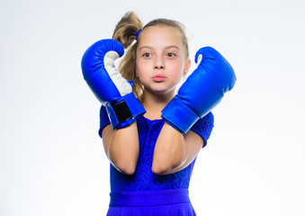 Be strong. Girl child with blue gloves posing on white background. Sport upbringing. Upbringing for leadership and winner. Strong child boxing. Sport and health concept. Boxing sport for female